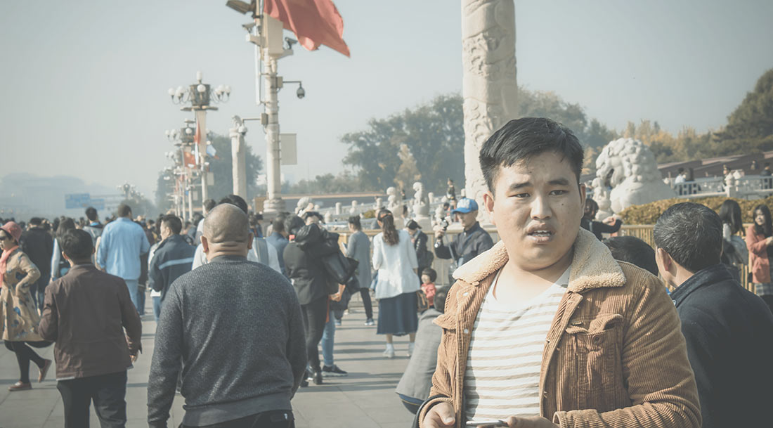 A Chinese guy in Tiananmen Square, China.