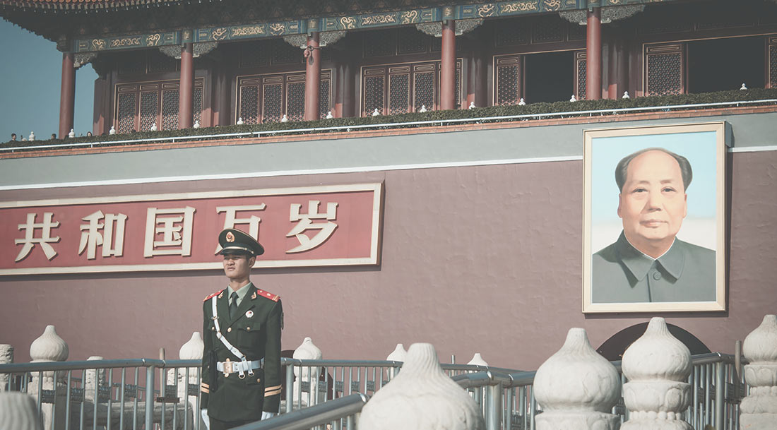 A guard in front of the Forbidden City in Beijing, China.